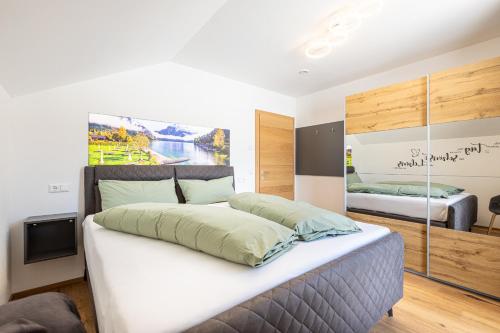 Posteľ alebo postele v izbe v ubytovaní Alpenlodge Bad Mitterndorf