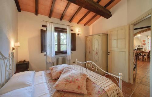 En eller flere senge i et værelse på Casa Delle Querce
