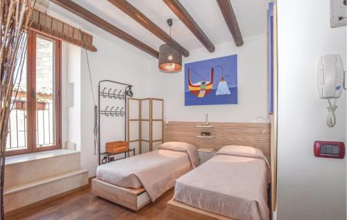Letto o letti in una camera di 2 Bedroom Beautiful Home In Ragusa Rg