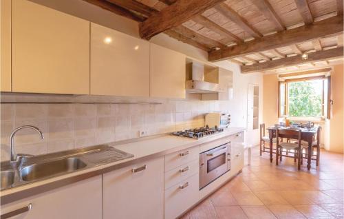 Una cocina o zona de cocina en Poggio Vecchio