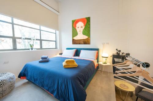 Posteľ alebo postele v izbe v ubytovaní Loft 19