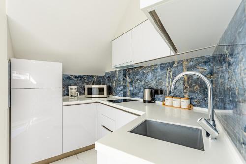 Una cocina o cocineta en Orden Apart Hotel