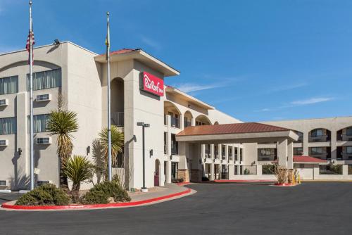a rendering of a hotel with a parking lot at Red Roof Inn Albuquerque - Midtown in Albuquerque