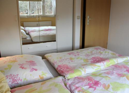 Posteľ alebo postele v izbe v ubytovaní Strandnest