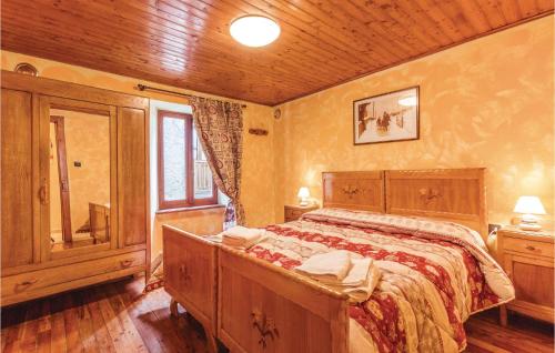 A bed or beds in a room at La Pila