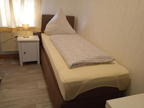 Säng eller sängar i ett rum på Hotel & Restaurant Zum Adlersberg