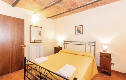 Tempat tidur dalam kamar di Poggio Santa Maria