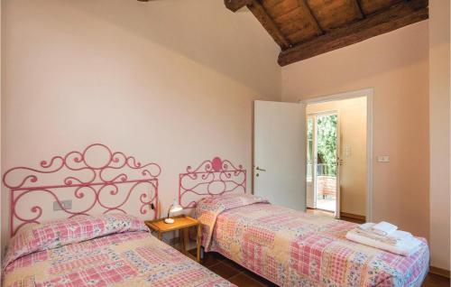 Säng eller sängar i ett rum på Il Granaio