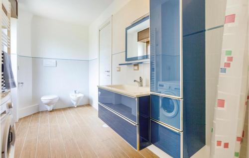 a bathroom with a sink and a toilet at Gorgeous Apartment In Lettere -na- With Kitchen in Lettere