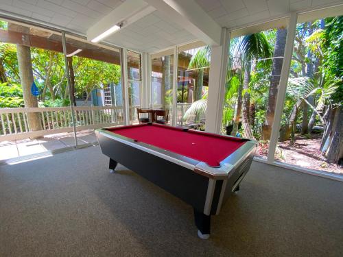 a pool table in the middle of a room at D313 - Sea Blue in Oceanside