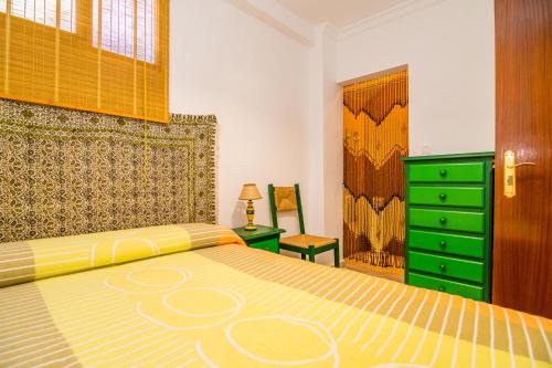 Postel nebo postele na pokoji v ubytování Casamonteymar Dolores