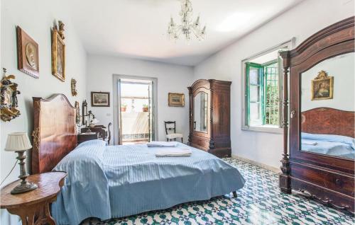 מיטה או מיטות בחדר ב-Castello Mortellito
