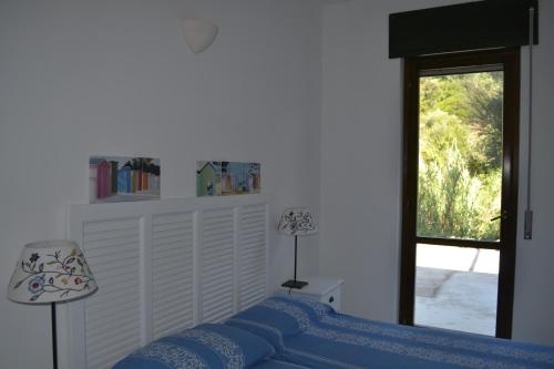 Una cama o camas en una habitación de Blu OltreMare