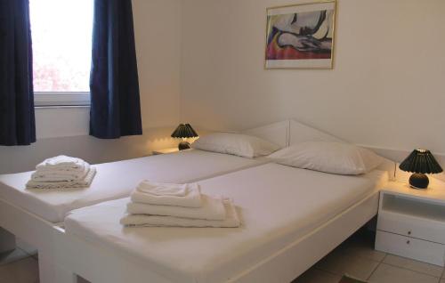 Cama ou camas em um quarto em Soleiliosonne Haus Minos