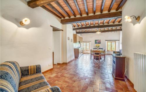a living room with a couch and a table at Le Caselle in Cortona