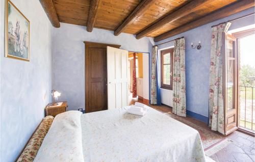 Ліжко або ліжка в номері Casa I Fiordalisi