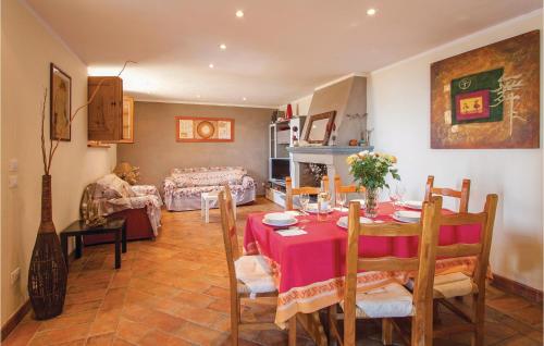 a dining room with a table and a living room at La Rosa E Il Limone in Montemagno