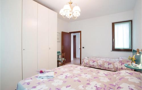 a bedroom with a bed and a couch at Casa Virginio in Pomonte