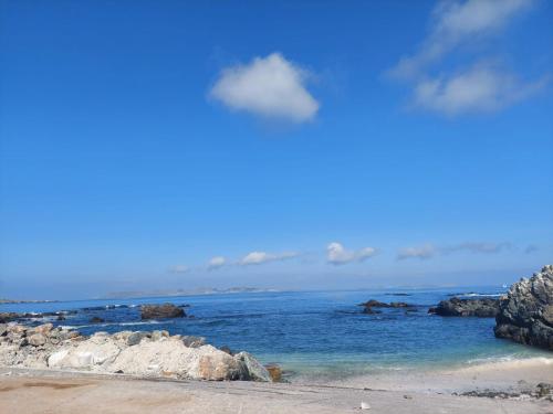 a view of the ocean from a beach at Refugio del Archipielago D3 in Punta de Choros