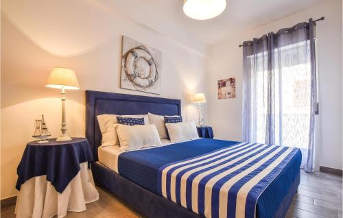 Posteľ alebo postele v izbe v ubytovaní Lovely Apartment In Trappeto With Wifi
