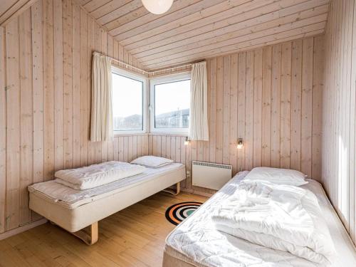 Katil atau katil-katil dalam bilik di Holiday home Hvide Sande LXXII