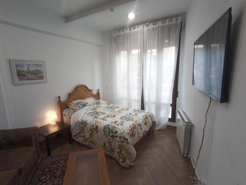 Ένα ή περισσότερα κρεβάτια σε δωμάτιο στο Mini Apartamento de Lujo