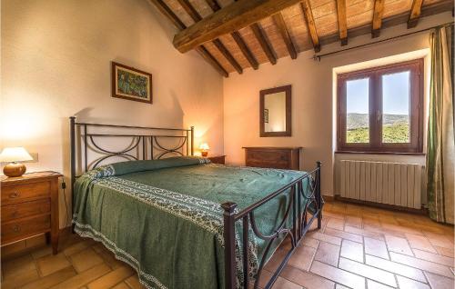 a bedroom with a bed in a room with a window at Portella in Saragano