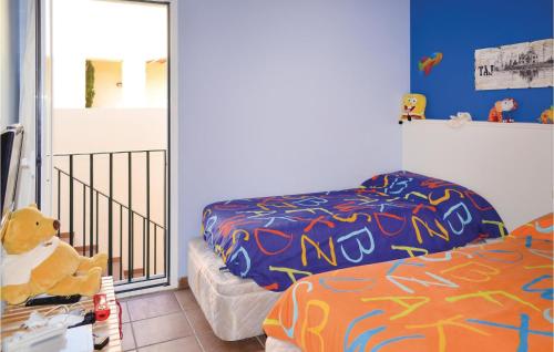 Katil atau katil-katil dalam bilik di 3 Bedroom Nice Home In Tossa De Mar