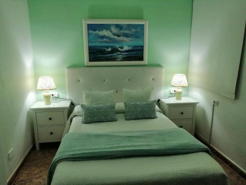 Ein Bett oder Betten in einem Zimmer der Unterkunft Anaga y La laguna a tus pies