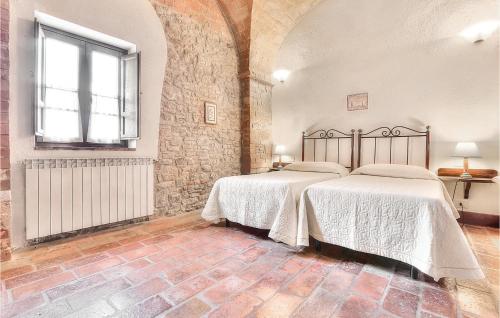 Giường trong phòng chung tại Vincenzo-podere Moricci