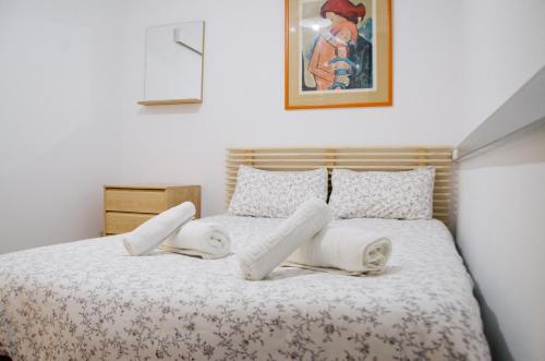 Cama ou camas em um quarto em Sagrada Familia Comfy apartment