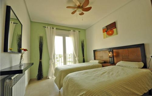 Säng eller sängar i ett rum på Amazing Apartment In Sucina With Wifi