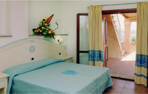 Postel nebo postele na pokoji v ubytování Awesome apartment in Golfo Aranci with 2 Bedrooms