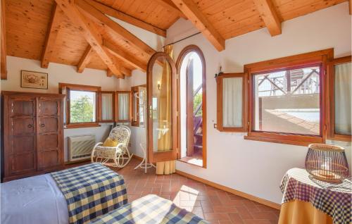 a bedroom with a bed and a window at Porta Di Valle 2 in Cavallino-Treporti