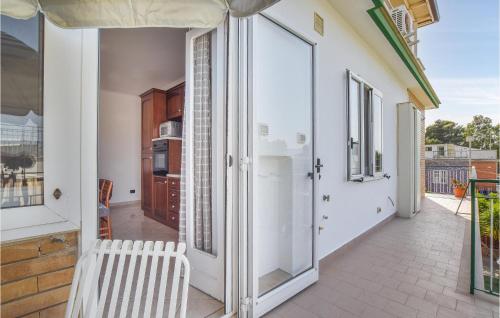 A balcony or terrace at 2 Bedroom Lovely Apartment In Siponto