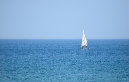 a sail boat in the middle of the ocean at Nice Apartment In Scoglitti With Wifi in Scoglitti