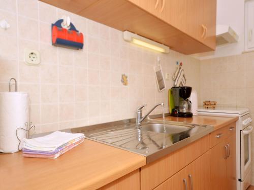 Kuchyňa alebo kuchynka v ubytovaní Apartment NADA