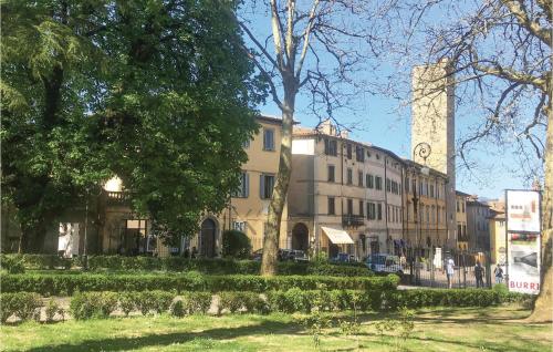 a building with a clock tower in a city at Borgo Lugnano in Lugnano