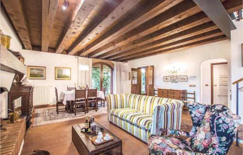 a living room with a couch and a table at La Ghiandaia in Le Marche