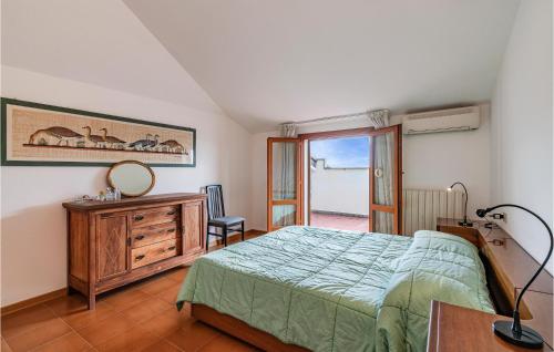 Villa Belvedere tesisinde bir odada yatak veya yataklar