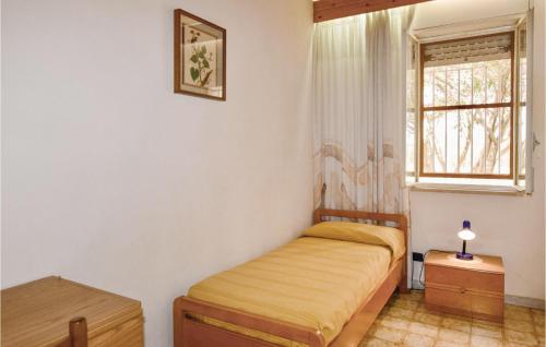Postel nebo postele na pokoji v ubytování Villa Ibiscus