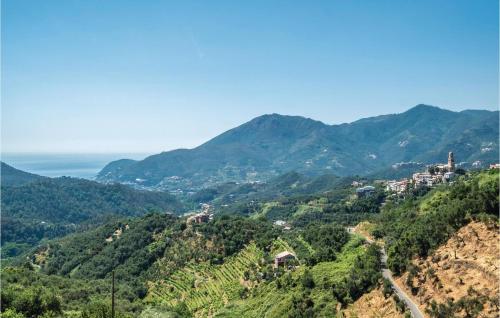 a mountain view of a town on a hill at Casa Rosmarino in Chiesanuova