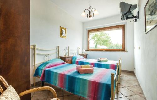 Postel nebo postele na pokoji v ubytování Poggiomelo
