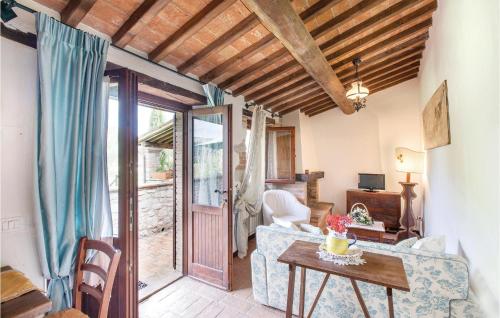 a living room with a couch and a table at Apartment Todi PG 28 in Canonica
