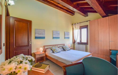 Säng eller sängar i ett rum på Villa Emeliarco