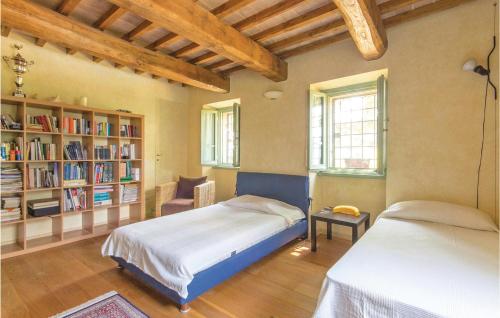 A bed or beds in a room at Podere Case Sparse
