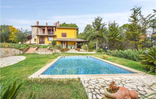 Awesome home in Santa Restituta with 6 Bedrooms, WiFi and Outdoor swimming pool