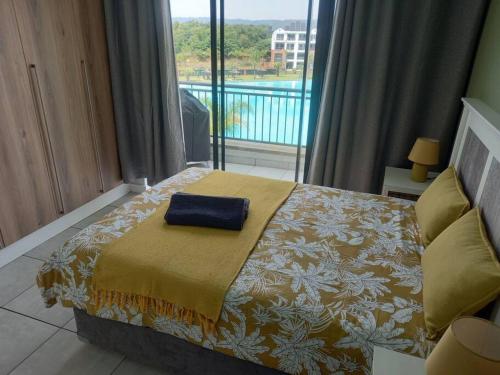מיטה או מיטות בחדר ב-Breathtaking Lagoon View Apartment @ The Blyde1531