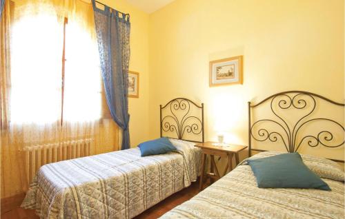 A bed or beds in a room at Gallonero 1