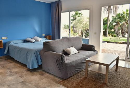 Гостиная зона в Bungalows Papalus - Golf Lloret -